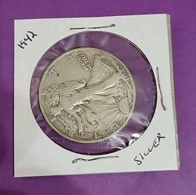 Side-by-side comparison of weak-strike vs sharp-strike 1942-S Walking Liberty Half Dollar showing Liberty's left hand detail